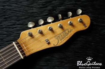 Model T. #039 Medium Aged - Faded Candy Tangeline with Siver