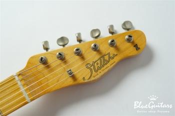 Model T. #113 Light Aged - White Blonde with Orii Blue